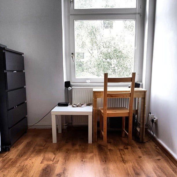 The end of the bedroom with a writing table :)