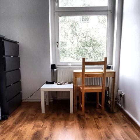 The end of the bedroom with a writing table :) by Scott Joyce