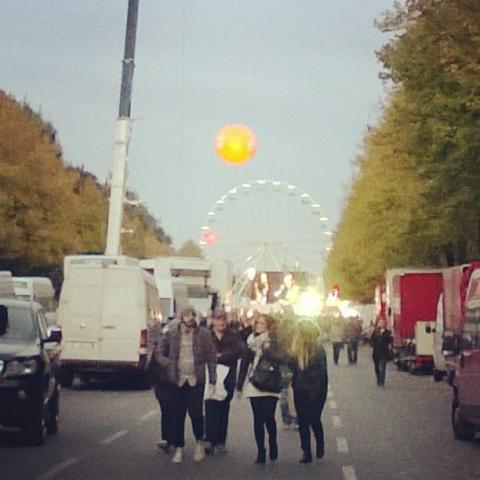 A giant orb sponsored by coke fills the sky and no-one cares. Th by Scott Joyce