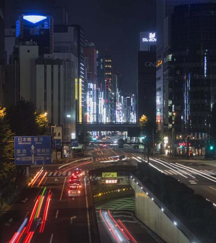 Long exposure looking out over Tokyo by Scott Joyce